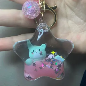 liquid filled globe, star, or shell keychain for purse or bag with cute creature inside, water ball charm gift