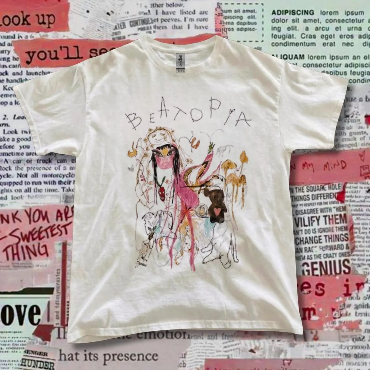 Beaxopia white cotton tee with graphic of a person with a dog and the words 'BEAXOPIA'