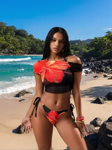 2026 fashion black and red printed off-shoulder short bikini set with tropical floral print and adjustable shoulder straps, perfect tropical vacation beachwear suitable for holidays