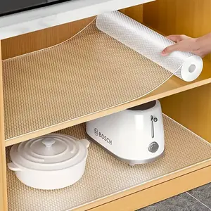 A cabinet mat, a non-stick drawer liner that is washable, waterproof, durable, and anti-slip, suitable for kitchens and drawers. Handplacemat