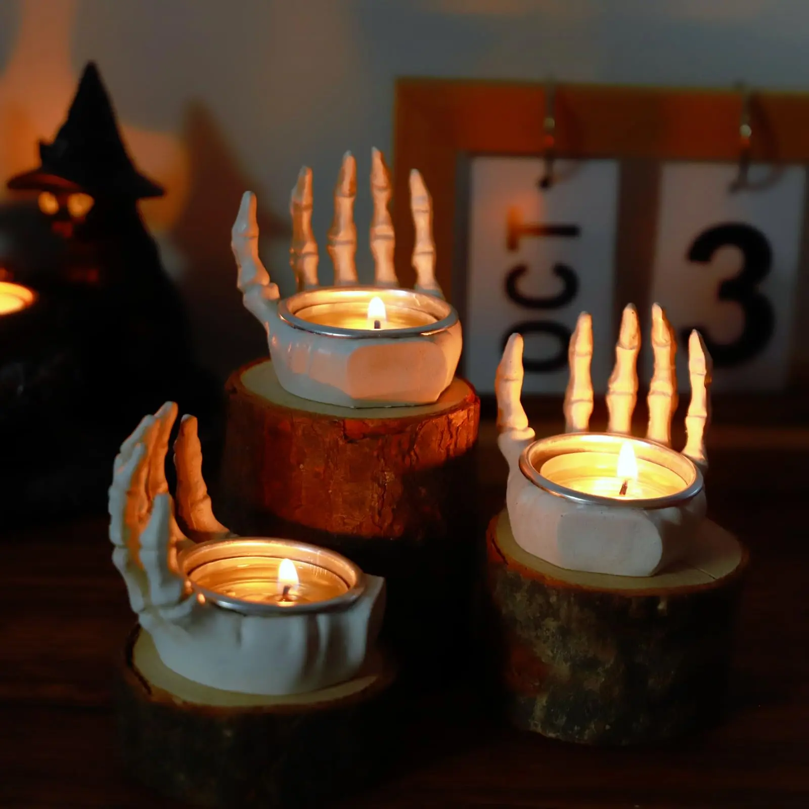 Gothic Candle Holders, Skeleton Hand Decor, Halloween Tea Light Holders, Spooky Table Decorations, Horror Themed Decor, Creepy Candle Stand, Haunted House Decorations, Gothic Home Accessories, Skull Hand Candle Holder, Scary Halloween Props
