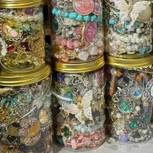 A Stunning Jewelry Jar with a Stunning Range of Ladies' Accessories, Including Necklaces, Earrings, Rings, Bracelets, and Pendants, Makes the Perfect Birthday Gift for Her.