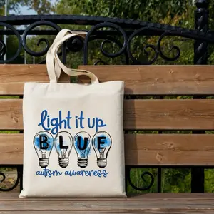 In April, we wear blue Autism awareness Tote canvas bag