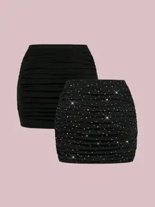 Two-piece women's mini rhinestone skirt set with beaded details; red skirt; curved skirt; pleated skirt.