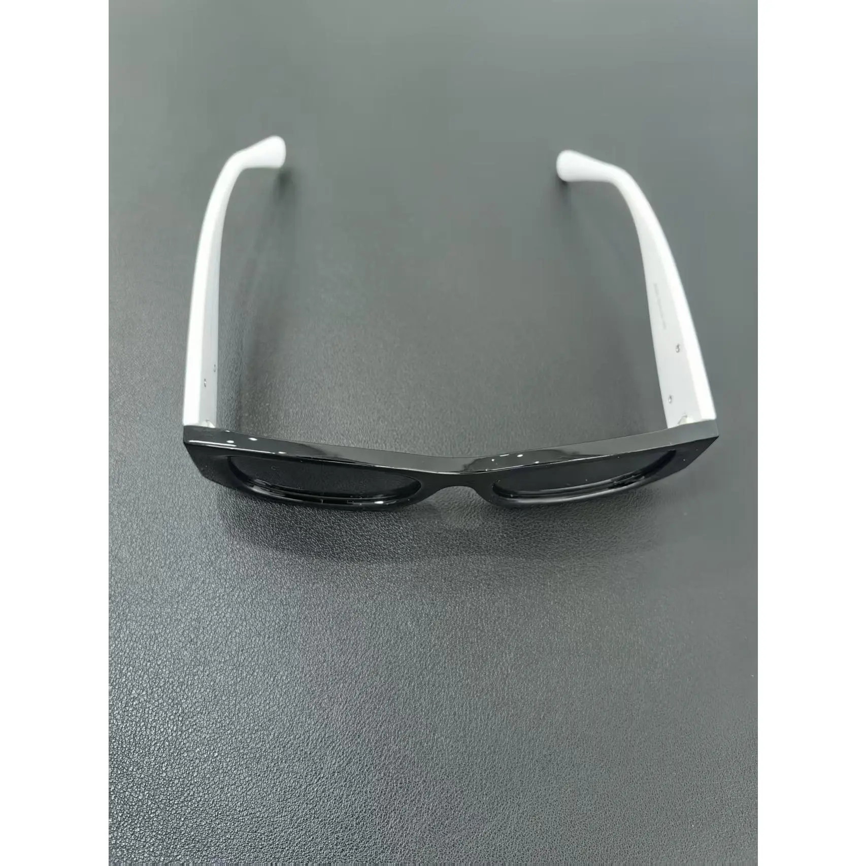 Elegant Black Frame Sunglasses with White Temples for Men and Women