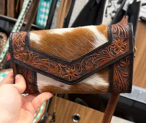 Genuine hand tooled leather & cowhide accordion style wallet- comes with wristlet strap and crossbody strap