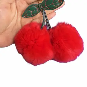 Cherry Puff Bag Charm or Keychain - Red Furry Design with Green Leaf Accents for Stylish Accessories