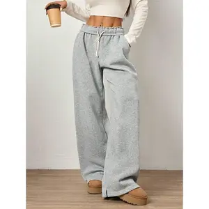 Women’s long baggy sweatpants with a drawstring waist tie, slant pockets, straight legs, and a casual street style—suitable for graduation, back-to-school outfits, teacher outfits for women, and fall clothing for women.
