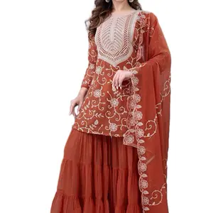 3 pcs Sharers set in heavy embroidery work in gorgatte fabric. Top length: 32 inches. Sharara length: 40-41inches