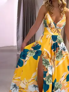 A women's stylish elegant printed V-neck slit backless slimming dress, suitable for summer, vacation, parties, and daily casual wear.