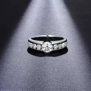 A timeless and classic engagement ring |     A striking main stone paired with side stones, creating the perfect proposal and commitment.