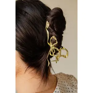 Gold Bow Squiggle Claw Clip