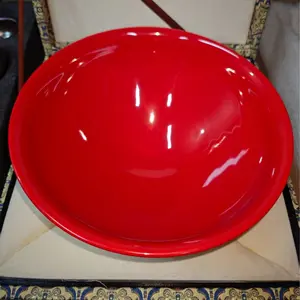 Red-glazed conical Jian ware tea bowl