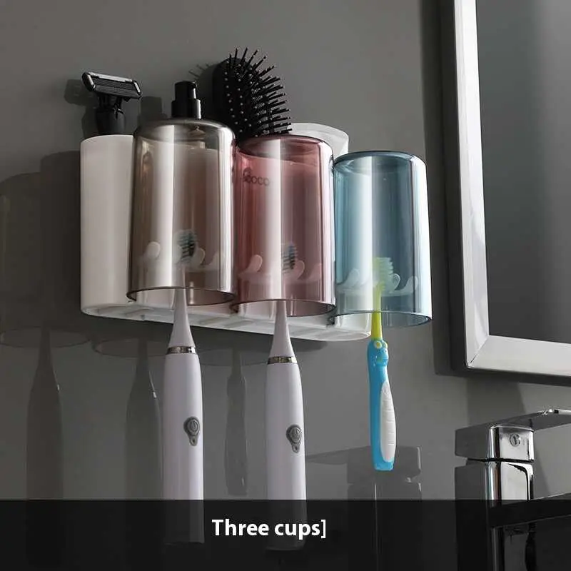 Three cup toothbrush holder