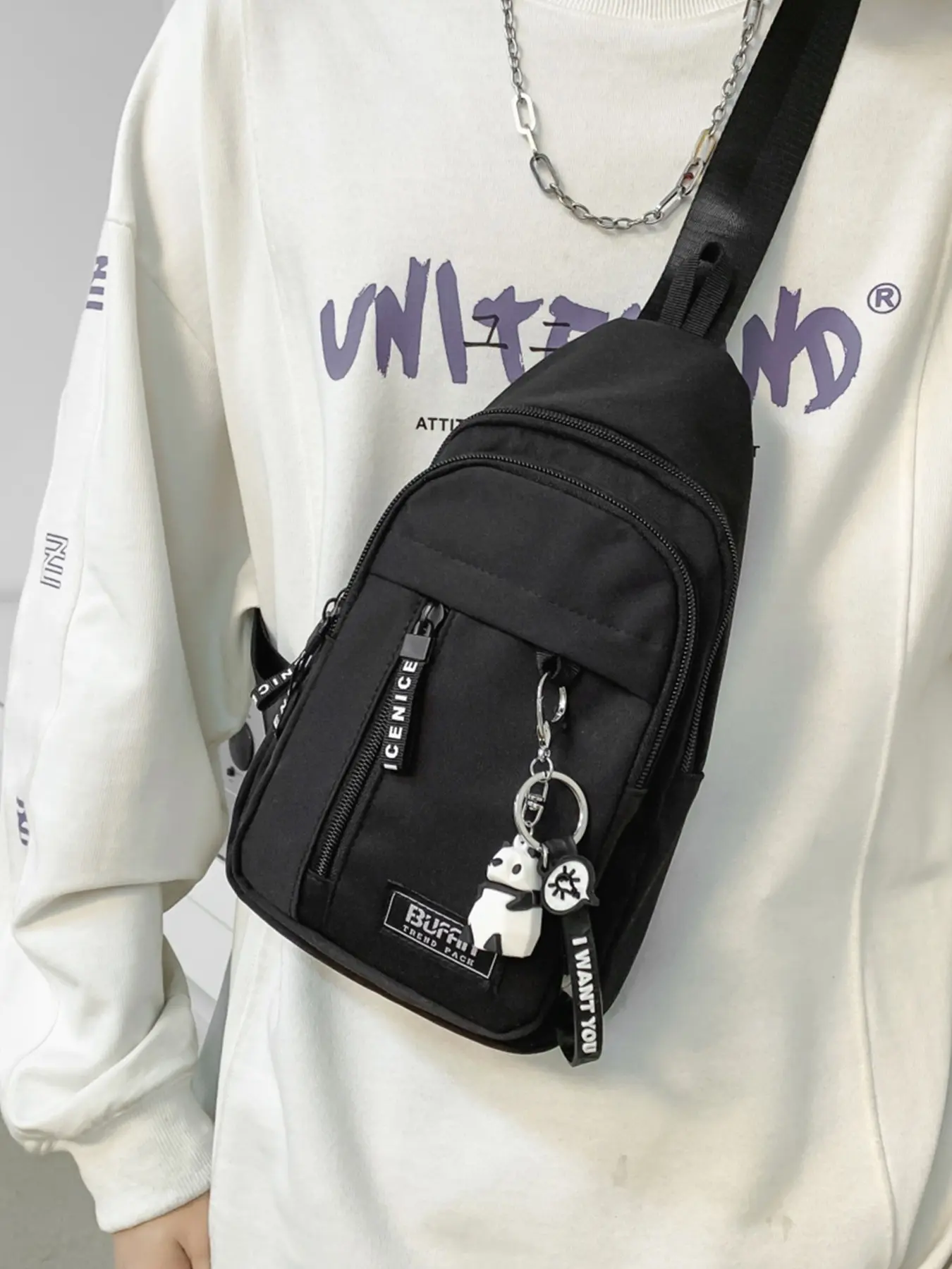 Casual trendy, simple and versatile chest bag with multiple zippered pockets, reasonable separation, fashionable and practical. It comes with a detachable cartoon pendant pendant, suitable for park walks and shopping