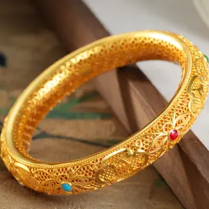 Design Sense Court-Style Hollowed-Out Filigree Bracelet 88 ST90018 with Intricate Gold Plating and Gemstone Accents