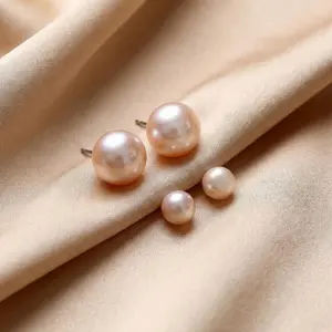 Pink round pearl stud earrings, elegant and sophisticated pearl studs, luxurious pearl jewelry, sparkling pearls, fashionable large pearl studs, makeup, round shape, mature women and girls, business casual, parties, weddings