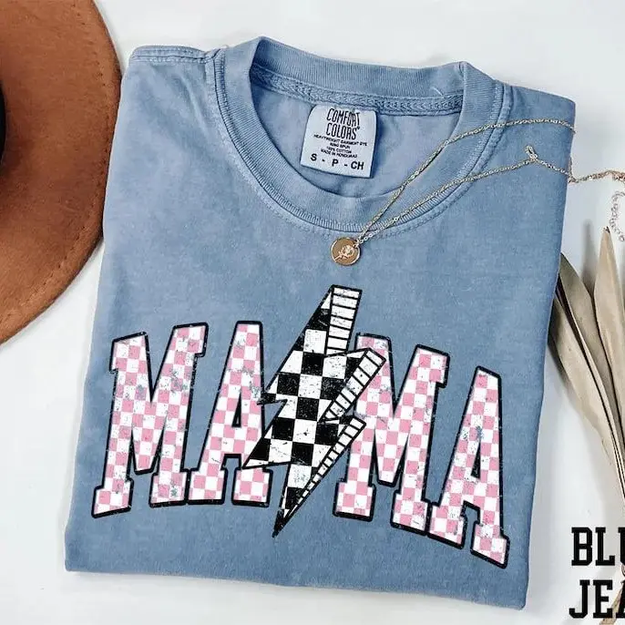 Comfort Colors Retro Mama shirt with checkered and lightning bolt designs, vintage style perfect for new moms, a great Mother’s Day gift for trendy moms everywhere.