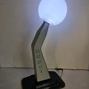 Hotrod Hurst Shifter Multicolored LED Lamp with white knob and Black Base and remote.