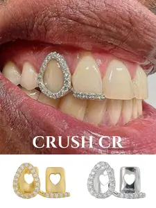 CRUSH CR 1pc 14K Gold Plated Teardrop Grillz with Cubic Zirconia, Hollow Heart Design,Fashionable Statement Trendy Hip-Hop Tooth Jewelry, Tooth Gems for Black Women, Girls, Men. Sparkling CZ Accents, Elegant Bold Style. Perfect for Parties, Halloween
