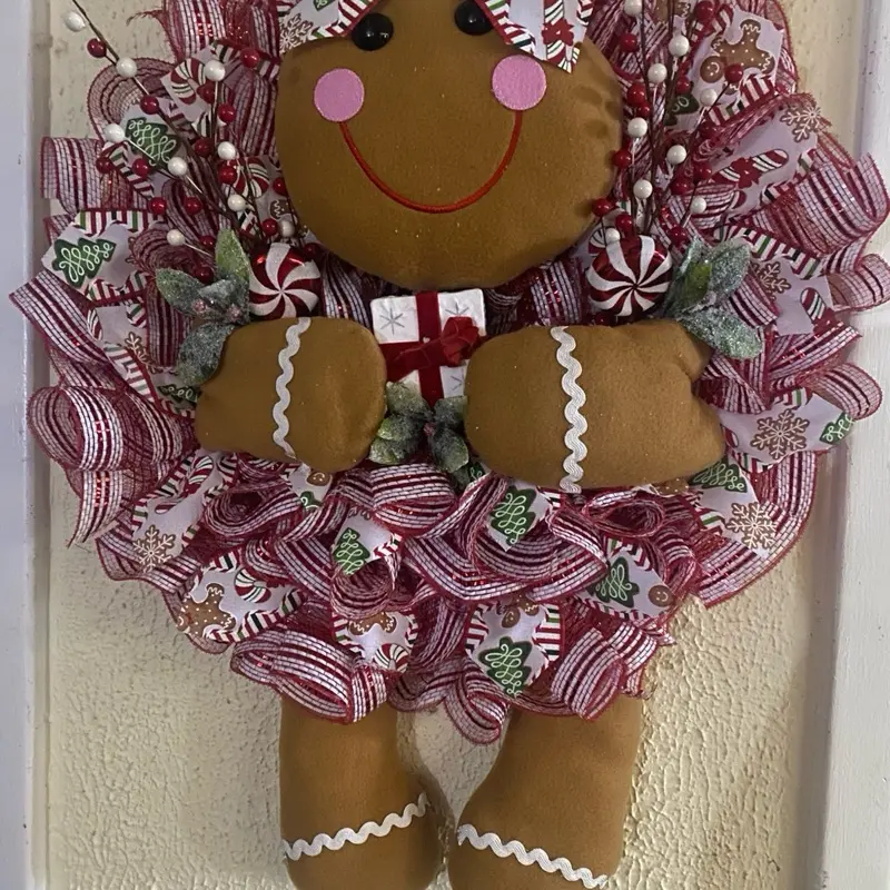 Gingerbread Christmas Wreath with Festive Red and White Ribbon and Adorable Gingerbread Man Design for Holiday Decor