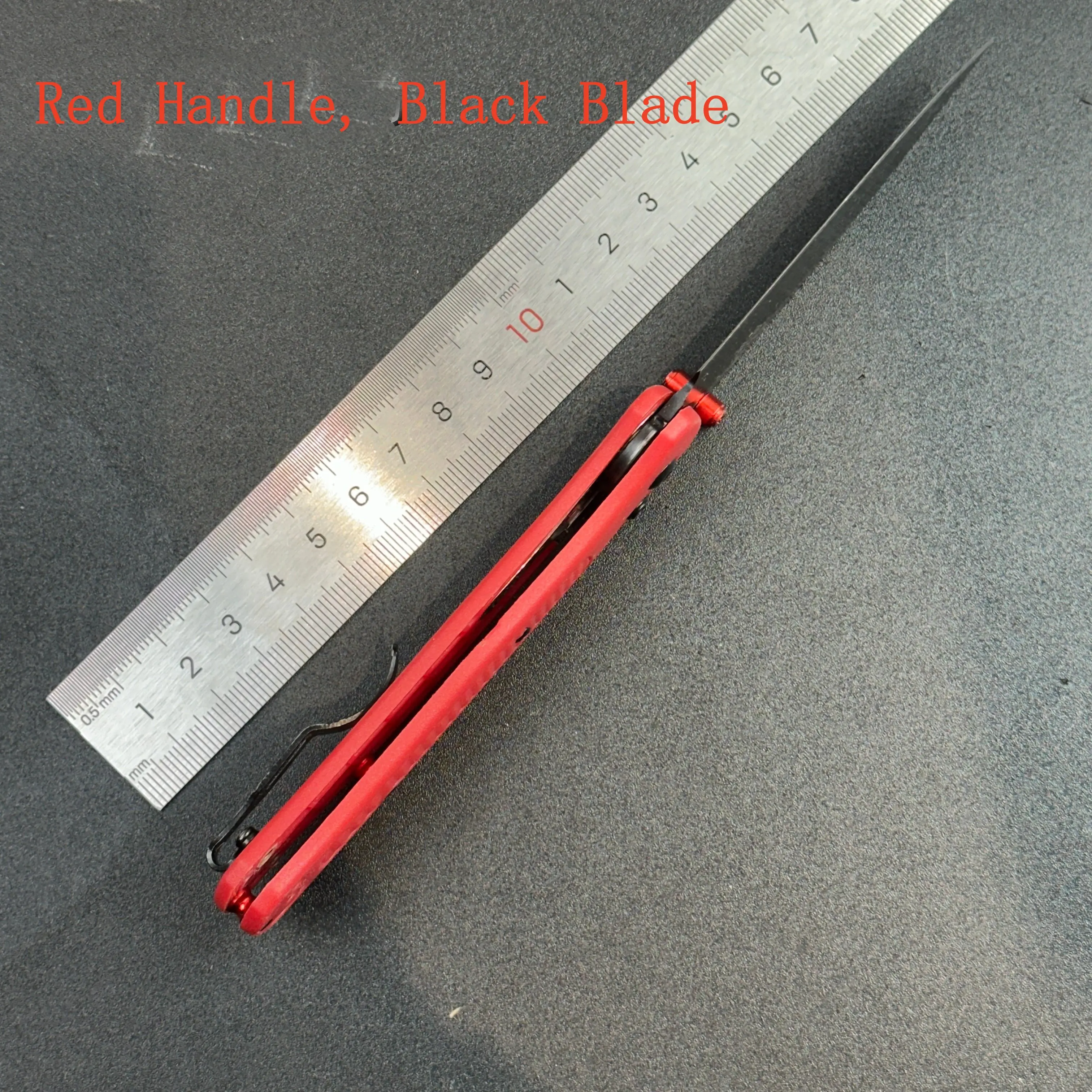 Red Handle, Black Blade