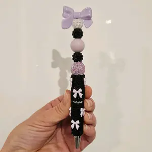 Glitz Beaded Pen with Colorful Beads topped with a bow.