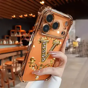 Creative diamond and gold V pattern, drop-proof and non-slip TPU full-coverage lens-plated phone case, compatible with iPhone 17, 16, 15, 14, 13, 12, 11, XS, X series and other models. Makes a great gift for friends or family.