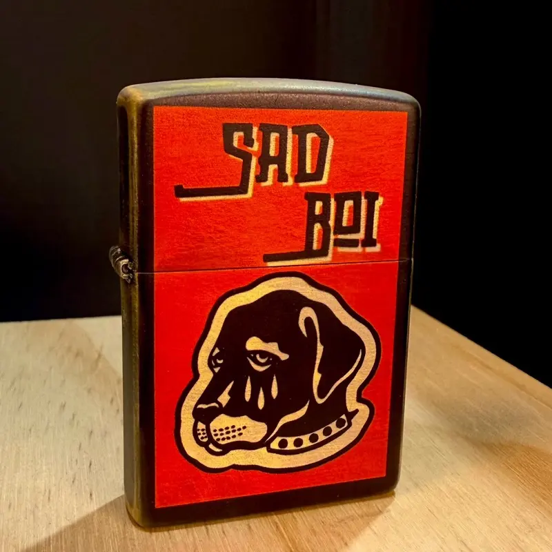 Sad Boy custom gold Zippo lighter