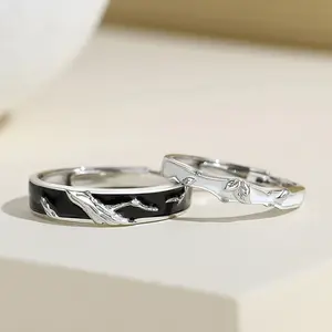 A pair of couple rings with a forest-style design and creative leaf rings for men and women, adjustable