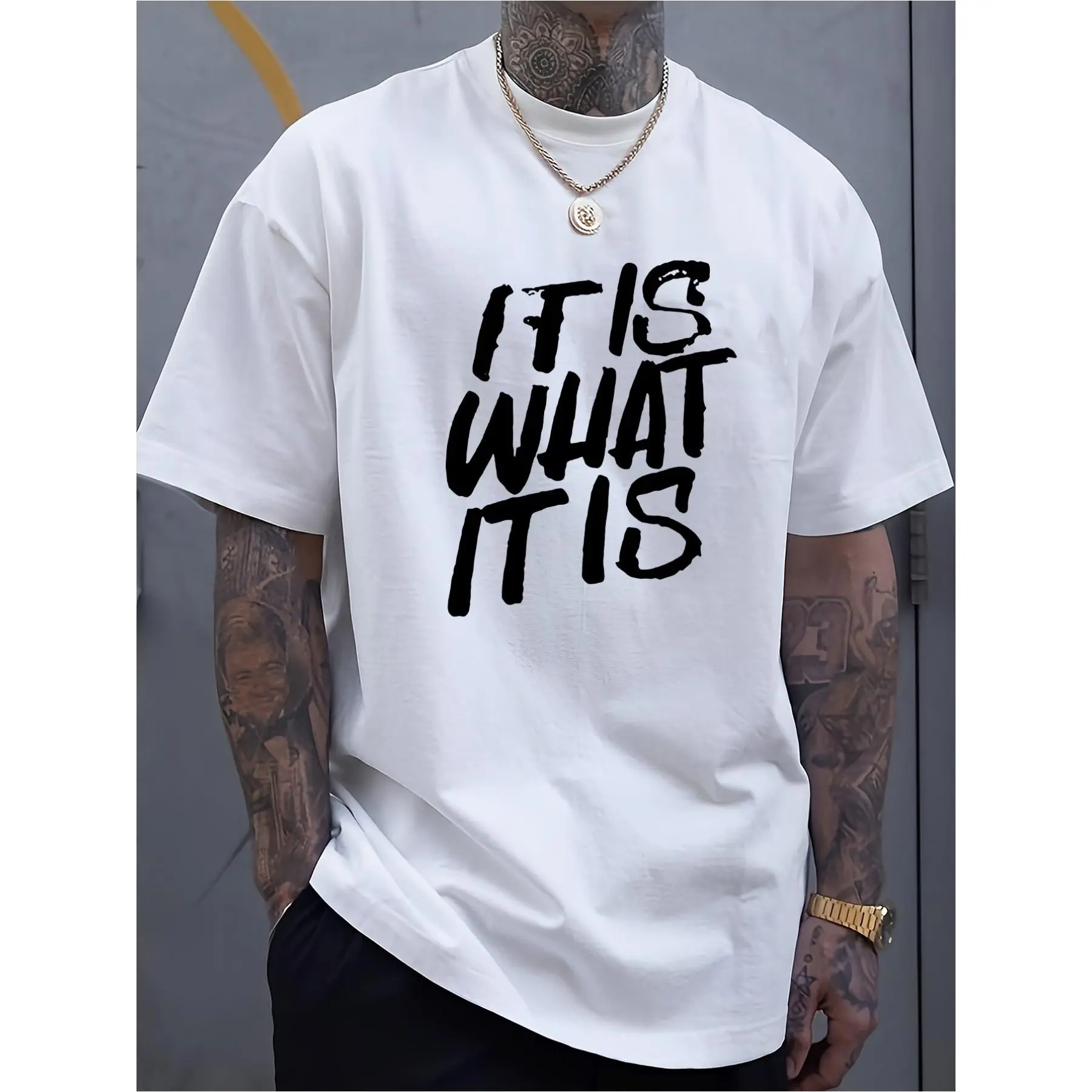 Men's "IT IS WHAT IT IS" Graphic Tee - Casual Short Sleeve Breathable Cotton Tshirt, Soft Comfortable Round Neck Streetwear Menswear with Bold Black Lettering, Effortless Easygoing Choice for Casual Days, White Sports Top with Streetwear Vibe