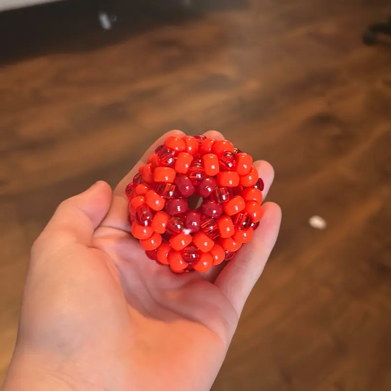 Kandi Stress Ball - Red Beaded Handheld Squeeze Toy for Anxiety Relief and Stress Management