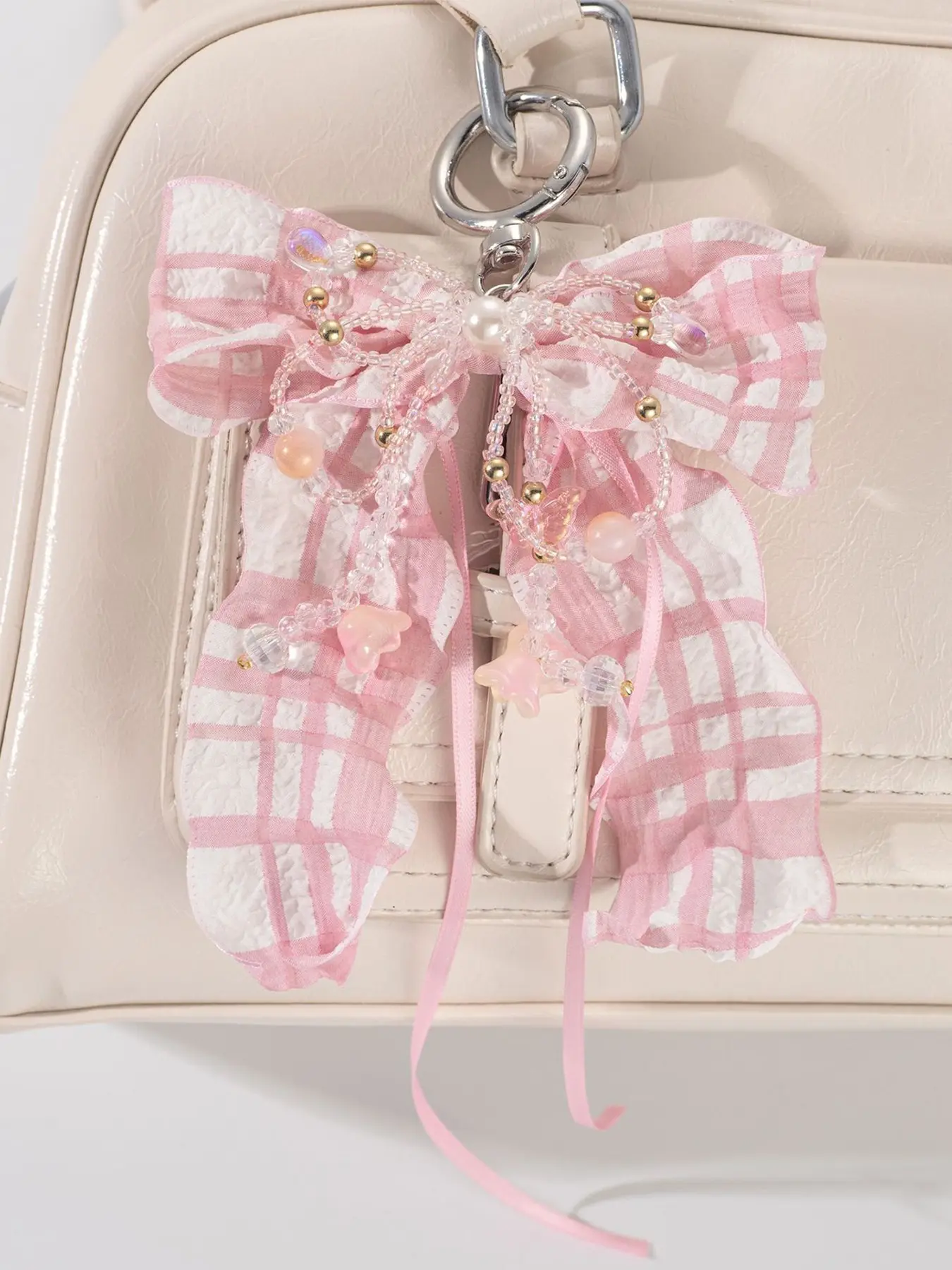 Sweet and fashionable pink and white checkered bow pendant, adorned with beads and bell orchids, featuring a niche design and retro personality, Fashion Bag Charms suitable for all kinds of bags, with a gentle and exquisite style, Purse Accessories Charm