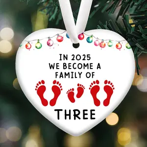 In 2025 We Become A Family of Three/Four, New Parents Gifts for Couples, Hanging Ornament for Expecting Mother, First Time Mom Dad Gift, Newborn Gifts Ceramic Heart Keepsake Ornament, Expectant Dad Mom First Time Mom Christmas Celebration Decor