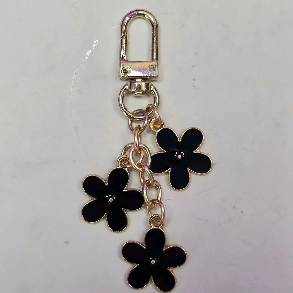 Black Daisy Flowers Kindle Charm
