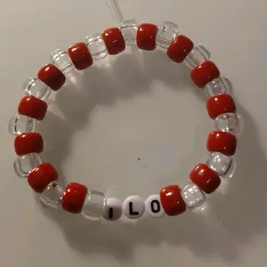 Red and Clear Bead Bracelet with "ILO And MILO" Letter Beads for Stylish Accessory