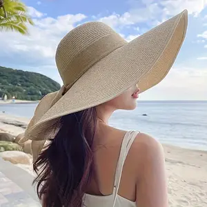 Women's Wide-Brim Straw Hat with Bow Detail Extra Large Brim for Sun Protection Lightweight Breathable Khaki Beige One Size Fits Most Ideal for Beach Outdoor Activities Summer Garden Park Travel Casual UV Shade Cover