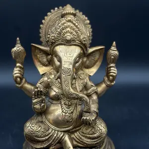 Ganesha Golden Statue - Intricate Design with Four Arms and Ornate Details - Ideal for Home Decor and Spiritual Practices