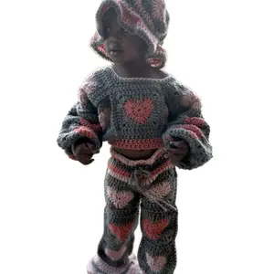 #stitchedbykiss custom crochet granny square set. Includes bucket hat, sweater, and flare pants.. This is gray, pink, and scarlet **all items are handmade custom crochet items…