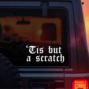 “’Tis But A Scratch” Vinyl Car Decal – Monty Python and the Holy Grail Inspired Funny Old English Font Sticker – Perfect for Covering Car Dings Scratches Bumper Humor Decal