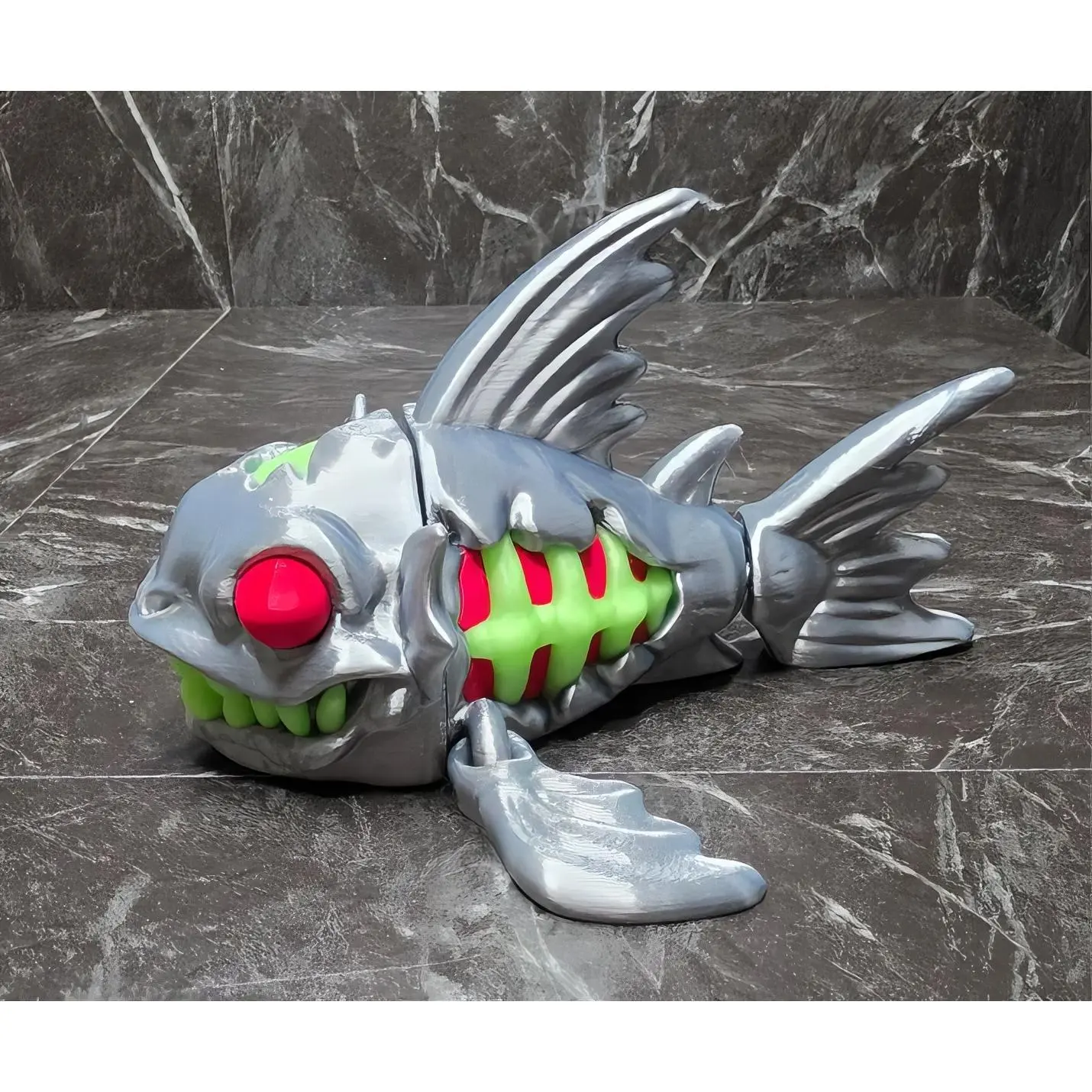 Zombie Fish Toy with Red Eye and Green Teeth, Silver Color, Fun and Unique Design for Kids