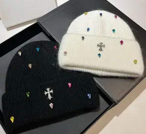 Charming Rhinestone Cross Knit Beanie—Incredibly soft and fluffy to the touch, so adorable you won't want to take it off.