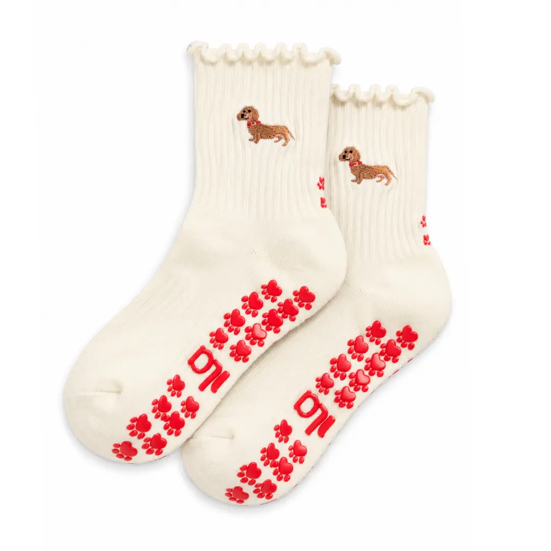 The Dachshund Embroidery Grip Sock with red paw-print grips for Pilates, Barre, Lagree, and Yoga