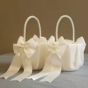 2pcs Set Solid Color Swallowtail Large Bow Pearl Handle Flower Girl Petal Basket, Suitable for Weddings,party favors,birthday gifts and Party Supplies. Applicable Scenes for Halloween and Christmas Include Christmas, New Year, Valentine's Day, and Party