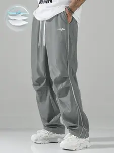 1 Pair Men's Lightweight Campus Cargo Pants with Side Stripes, Drawstring Waist and Minimalist University Style for Casual Streetwear and Daily Outings