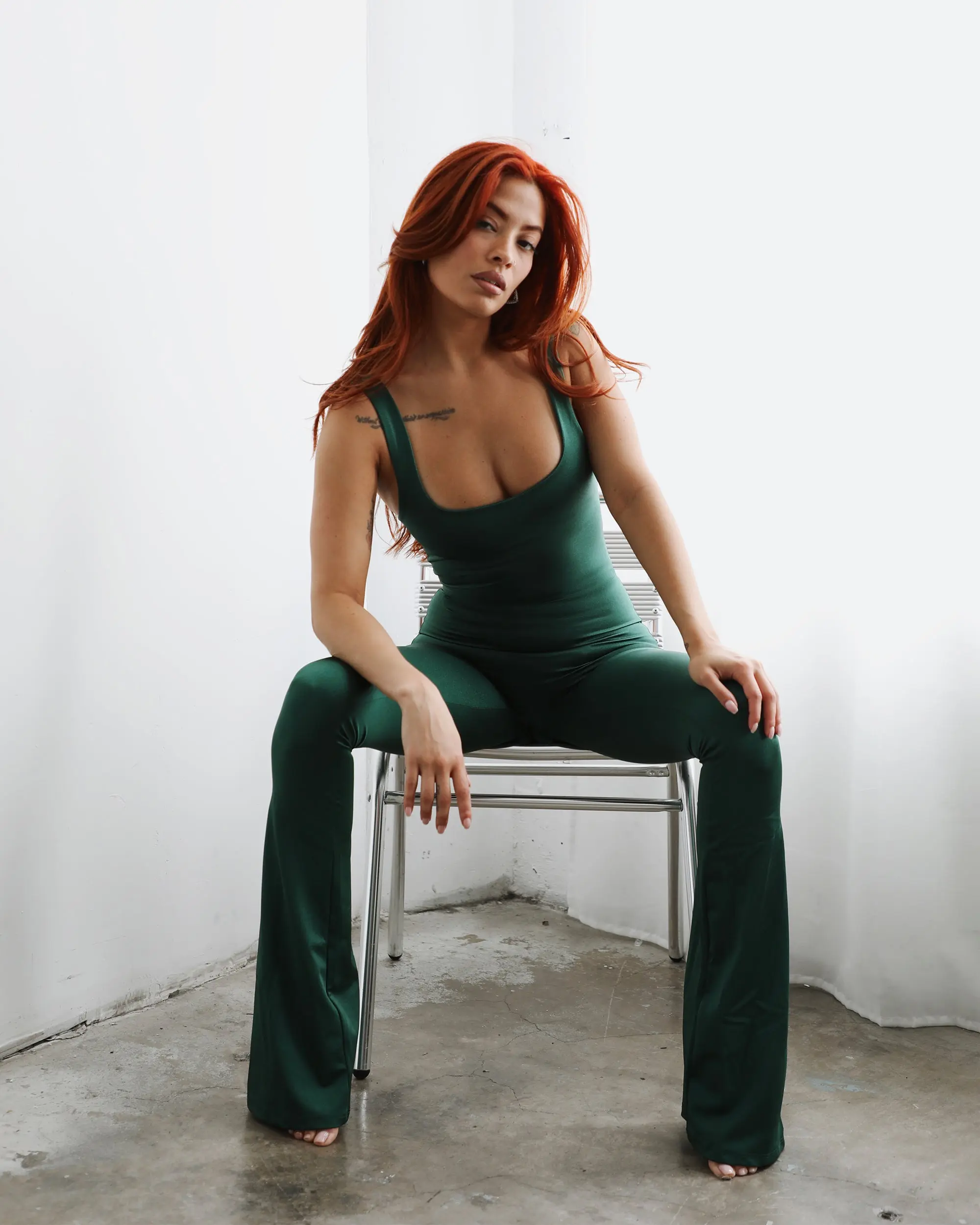 Papilio Bodysuit - Emerald Spandex Womenswear with Cutout Design, Flared Legs & Flat Top for Workout