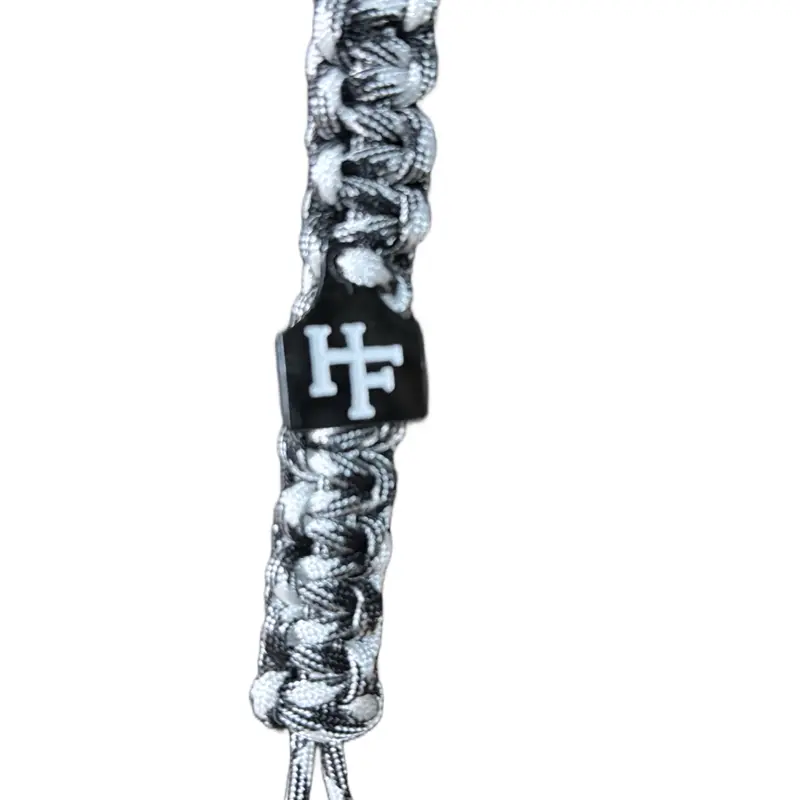 Handmaid Keychain Representing the Tag of Hippo Farms - Unique Design with Black and White Colors