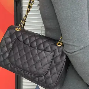 Vintage brown underarm bag, women's lychee-textured cowhide shoulder bag with crescent lock clasp.