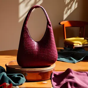 Crescent shaped women's bag hand woven hand-held dumpling bag fashionable single shoulder armpit bag