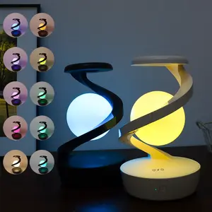 An RGB rotating table lamp  ornament night light  bedside table lamp  indoor  office desktop decoration ornament  romantic lighting wireless charging  holiday gifts